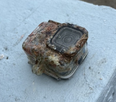 A second view of the recovered GoPro, with a relatively clean lens.
