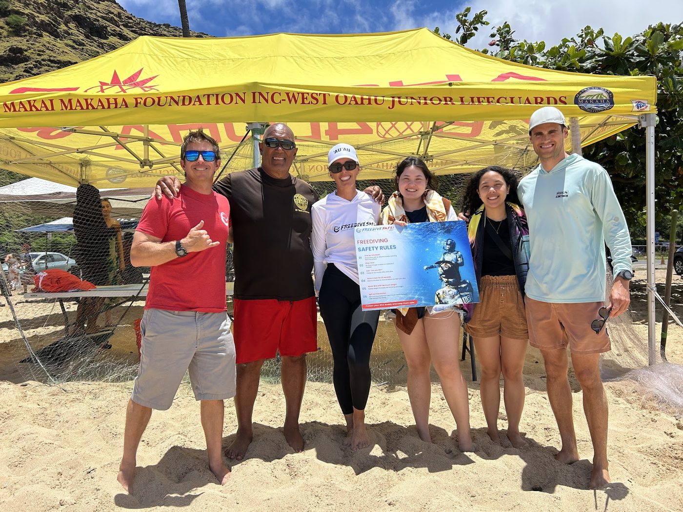 Interns Jane, Koa graduating from FreediveSafe! Hawaii training at Mauka to Makai Makaha Foundation event.
